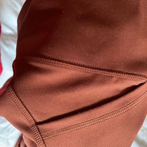 Brown large all in motion (target) leggings. Used a few times. Has a side pocket